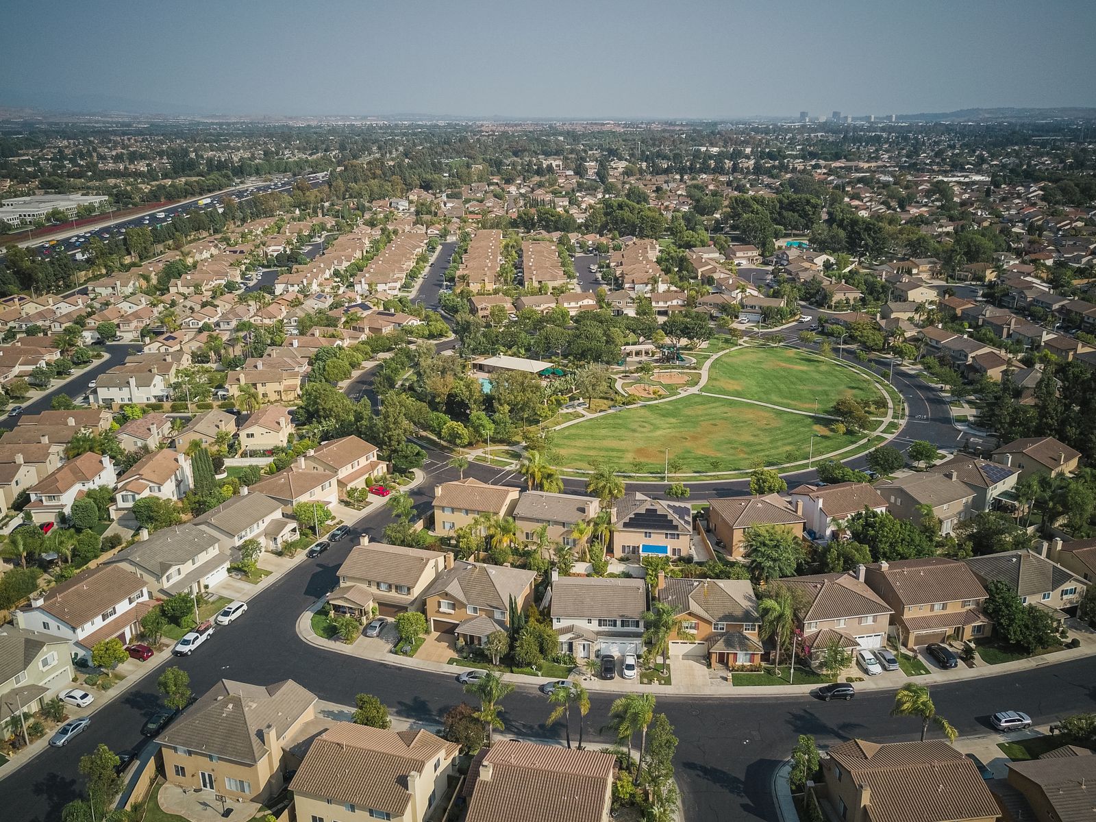 Aerial view of a suburban residential neighborhood affected by local zoning and variance decisions